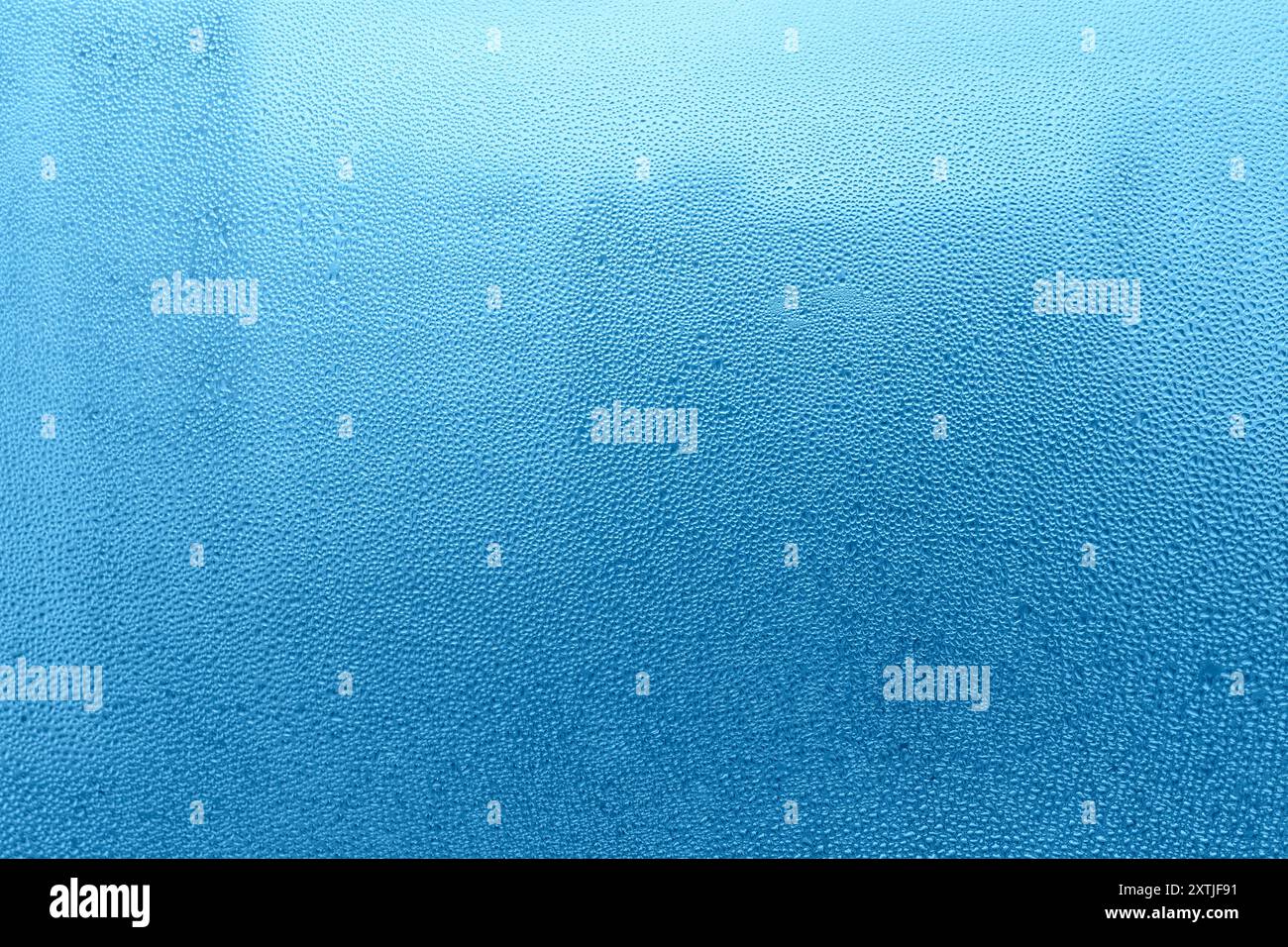 Blue background with natural water drops on glass Stock Photo - Alamy