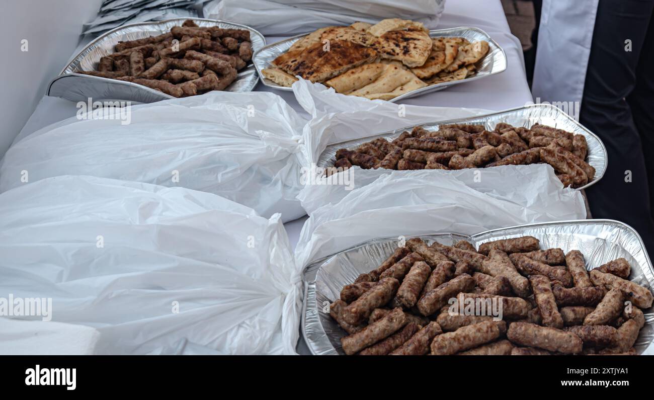 Free tasting of cevapi on Bascarsija Stock Photo - Alamy