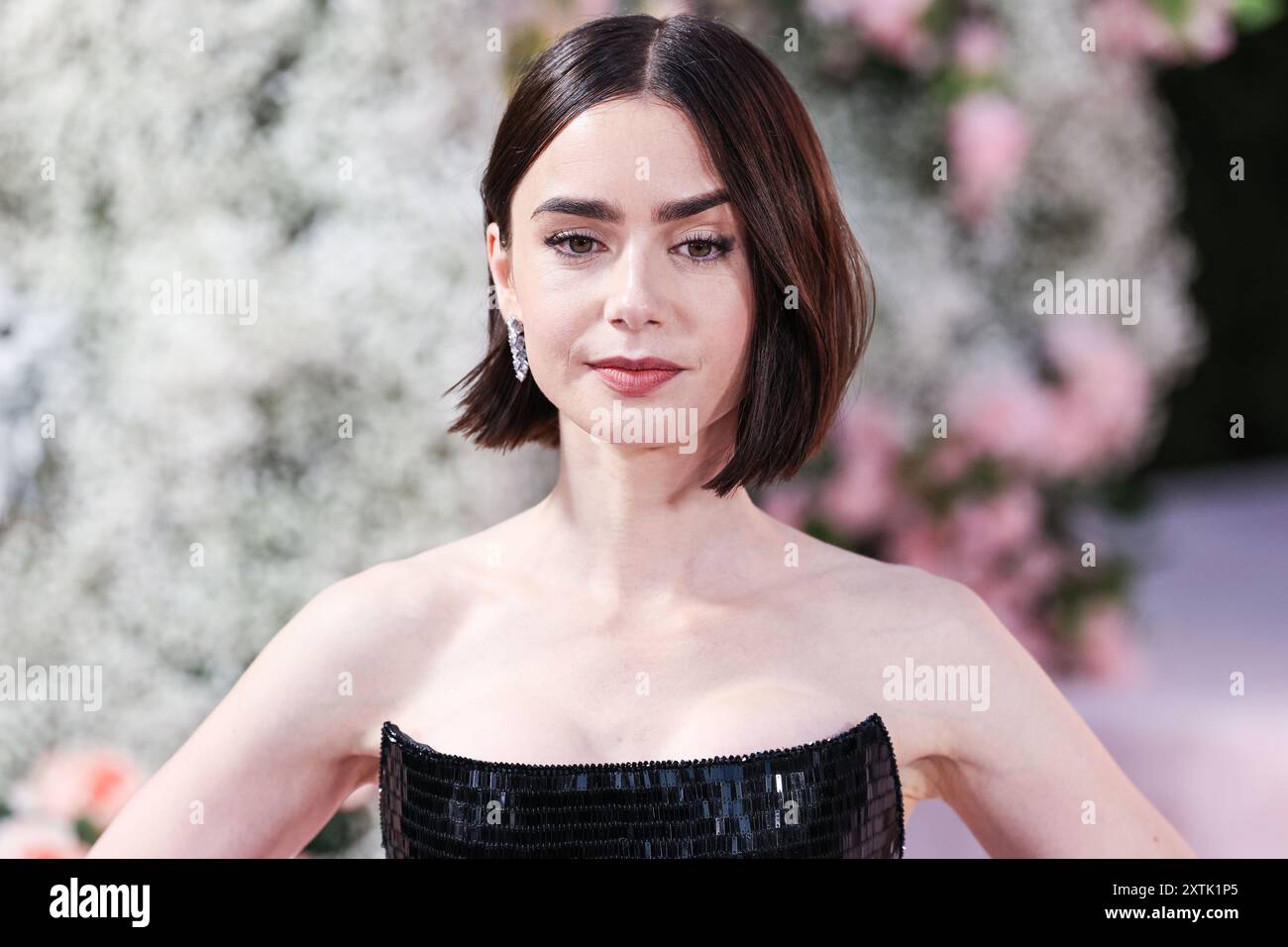 HOLLYWOOD, LOS ANGELES, CALIFORNIA, USA - AUGUST 14: Lily Collins wearing a  custom Armani Prive dress arrives at the Los Angeles Premiere Of Netflix's  'Emily In Paris' Season 4 Part 1 held