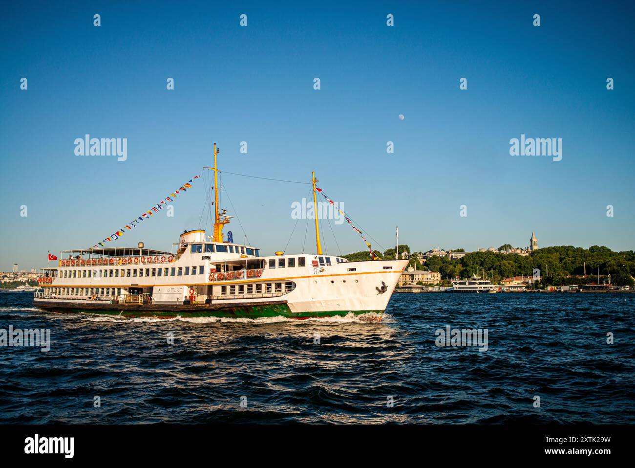 A picturesque view of the Bosphorus in Istanbul, featuring a passenger ...