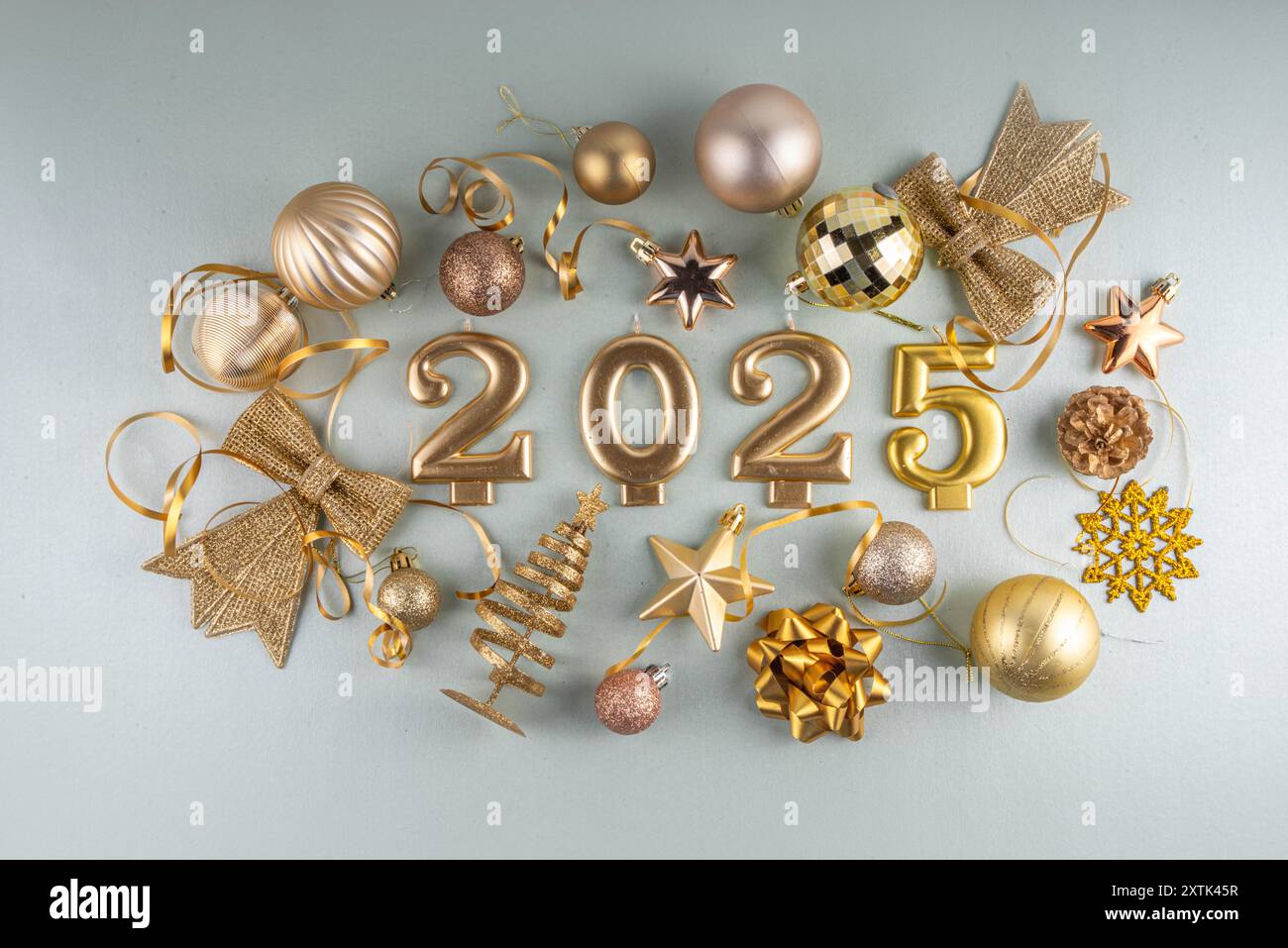 Merry Christmas and Happy New Year 2025 background with golden bauble, Christmas tree balls and