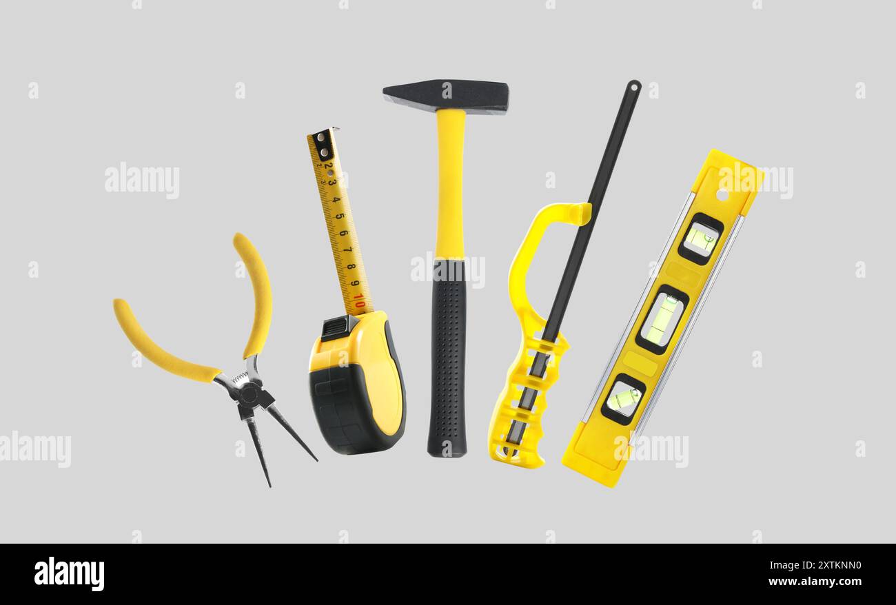 Set of different construction tools on light grey background Stock ...
