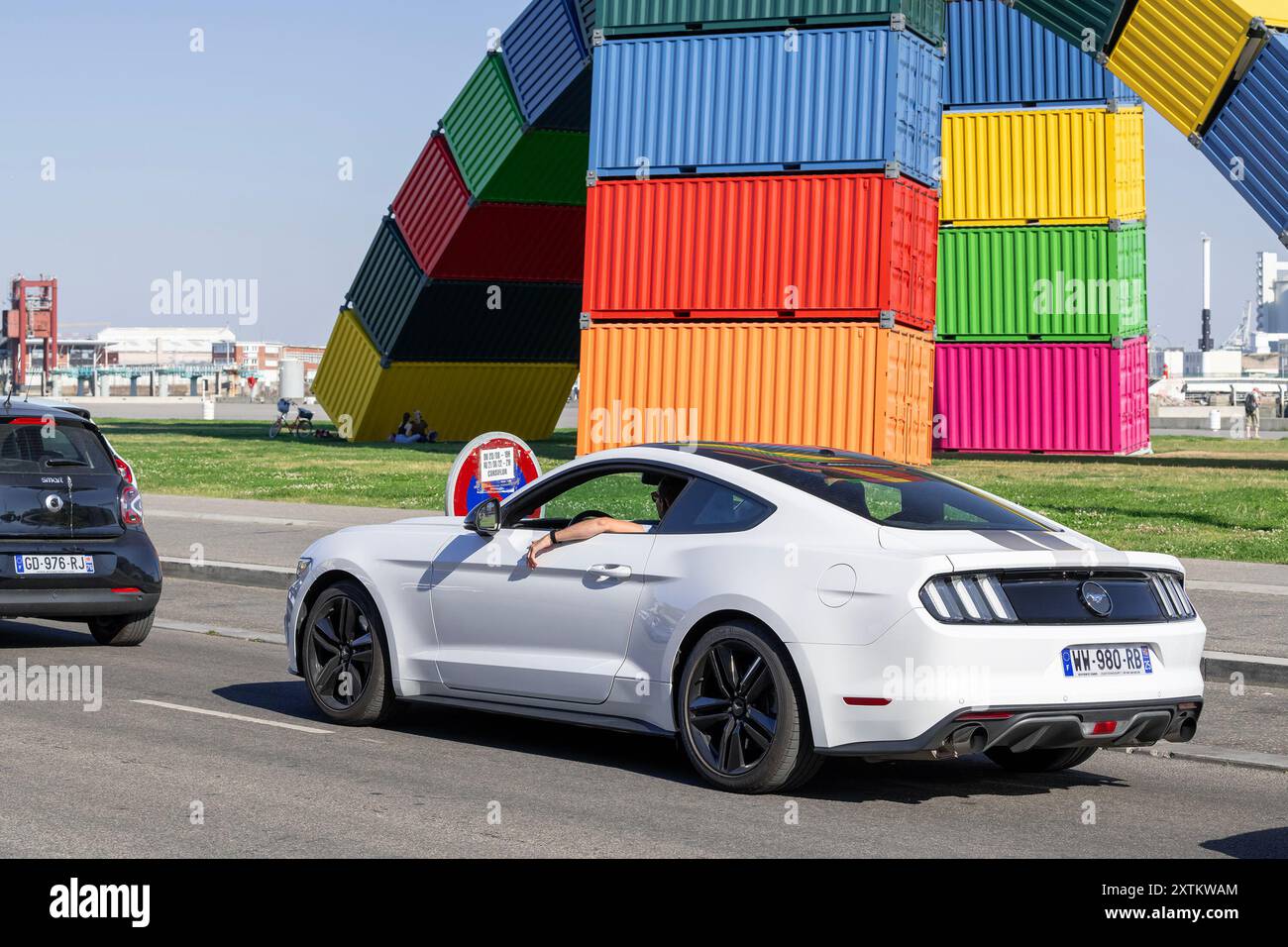 Le Havre, France - View on a white Ford Mustang Fastback driving on a ...