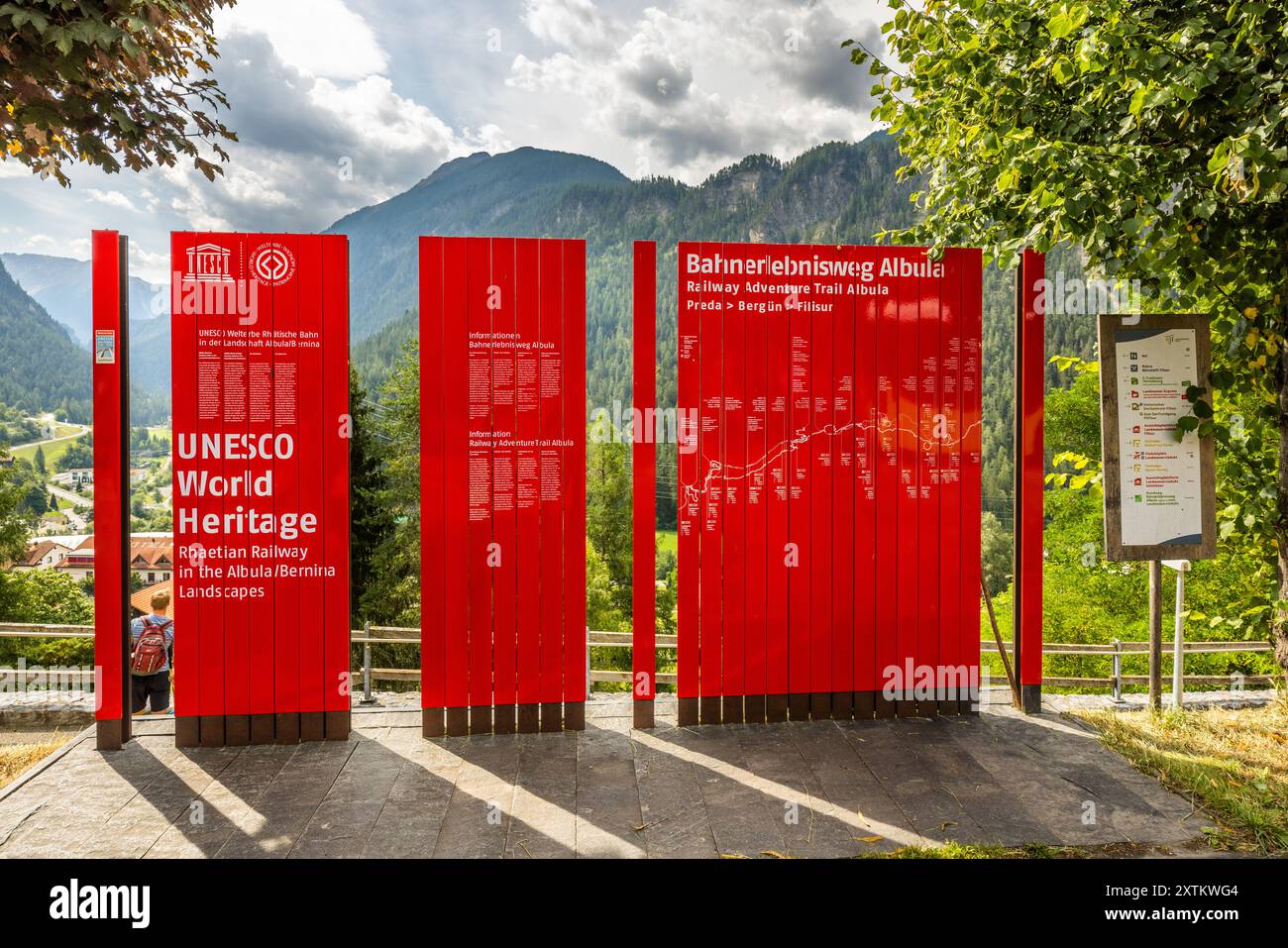 Albula Railway Experience Trail. The red steles commemorate the inclusion of the Albula and Bernina railroad lines in the UNESCO World Heritage List. Ride on the Albula railway line, a World Heritage Site. Fizeira Sura, Bergün Filisur, Grisons, Switzerland Stock Photo