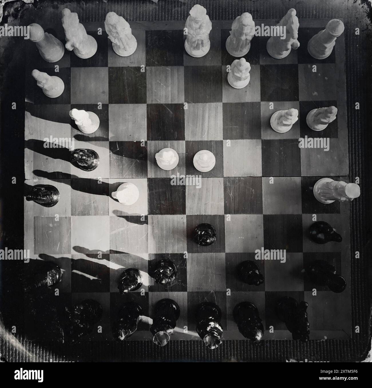 High angle view of chess board and chess pieces Stock Photo