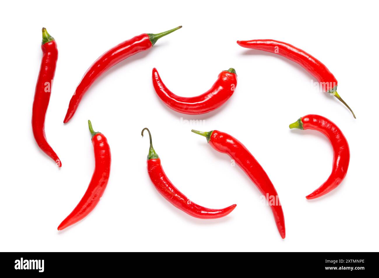 Red hot chili peppers on white background. Top view Stock Photo - Alamy