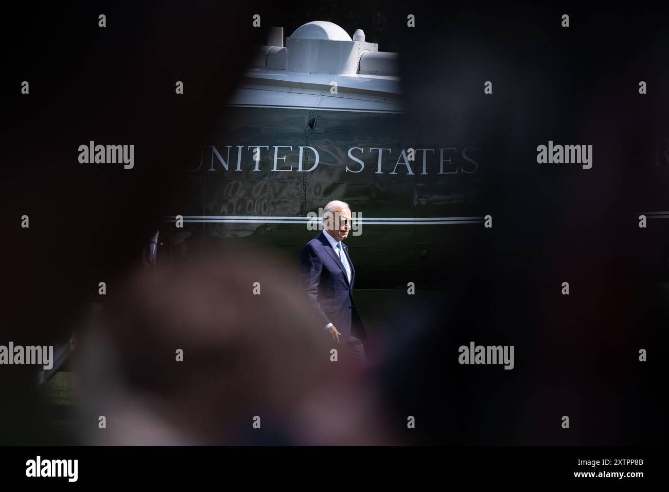 Washington, United States. 15th Aug, 2024. US President Joe Biden walks on the South Lawn of the White House after arriving on Marine One in Washington, DC on Thursday, August 15, 2024. Biden will returned to the campaign trail stumping for Vice President Kamala Harris. Photo by Anna Rose Layden/UPI Credit: UPI/Alamy Live News Stock Photo