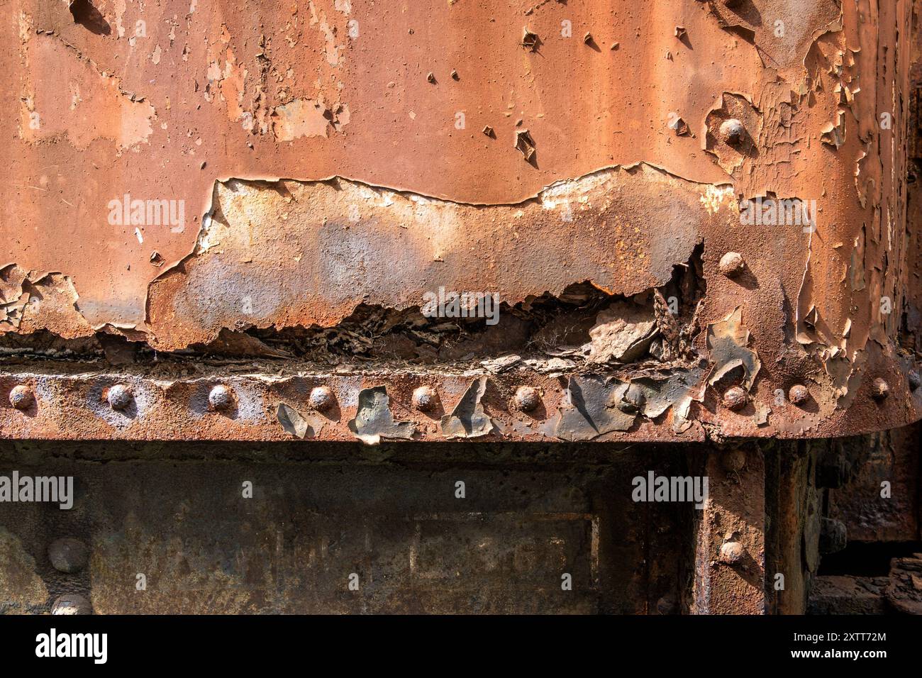 Details of an old rusty steam train weathered metal, peeling paint, and ...