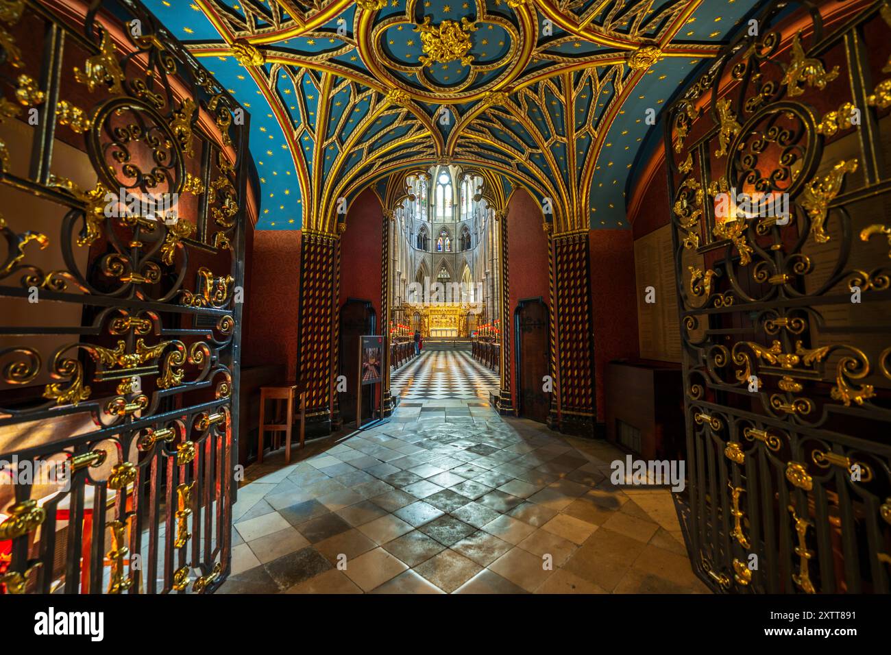 Inside Westminster Abbey the organ loft, the room before entering the Choir and High Altar. A beautiful, colorful room with iron gates in London, UK. Stock Photo