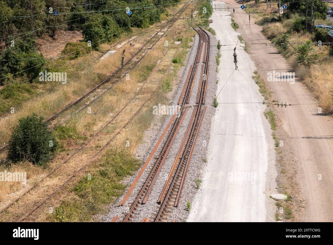 Laying a new railway track in an urban industrial area Stock Photo - Alamy