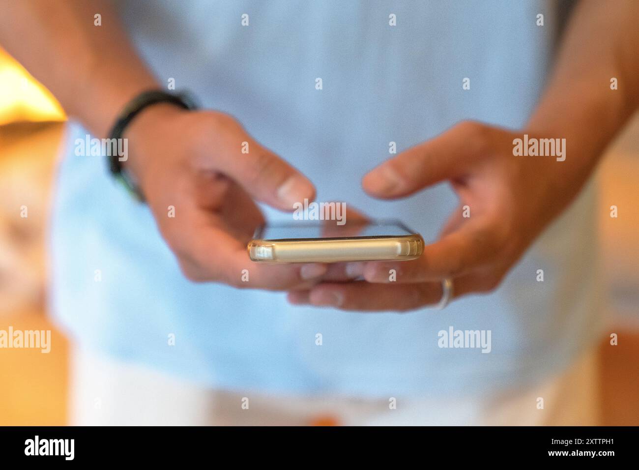 Image of hands using a smartphone Stock Photo