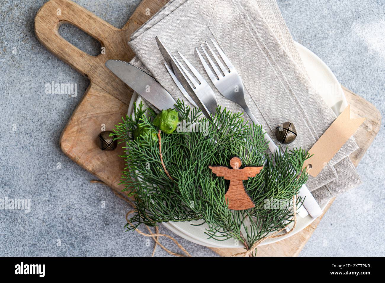 Christmas table setting with fresh thujia Stock Photo