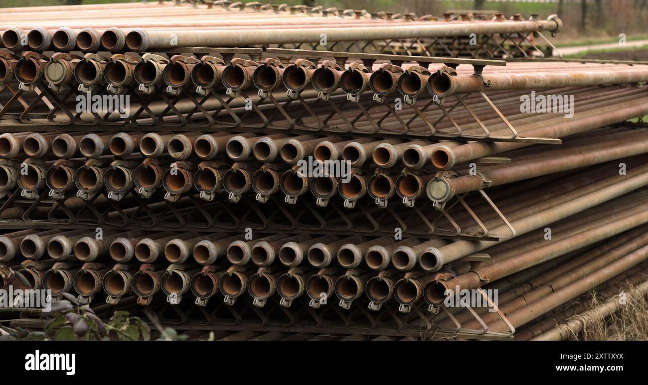 Water pipes irrigation on the field in agriculture Stock Photo - Alamy