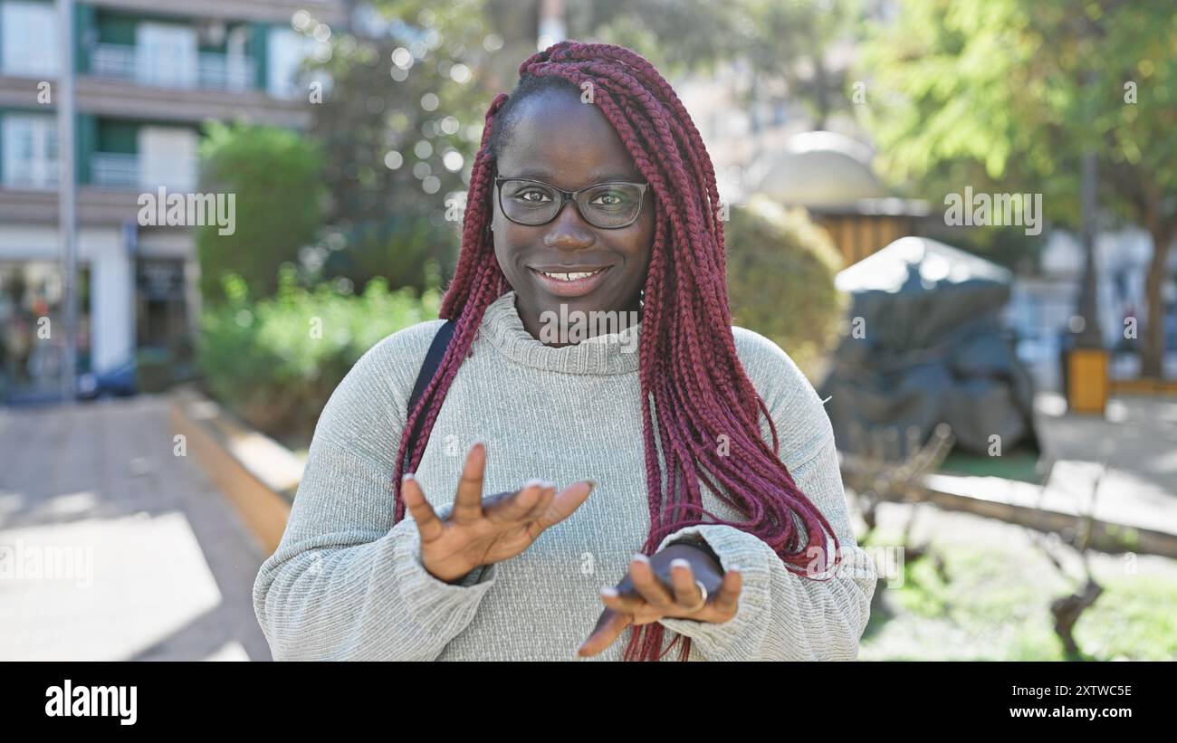 Woman wearing glasses braids hi-res stock photography and images - Alamy
