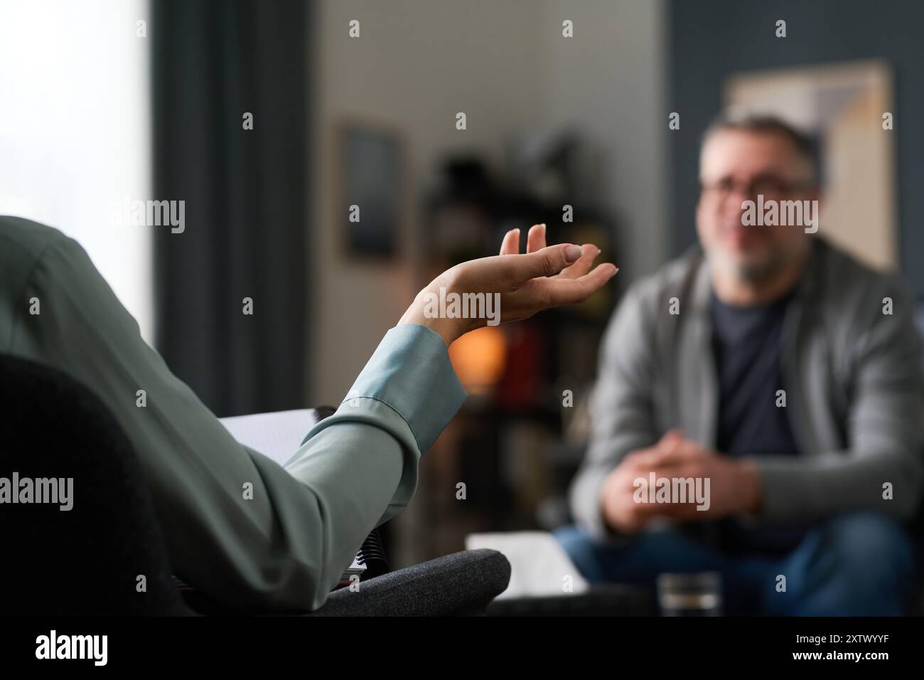 Therapist engaging in counseling hi-res stock photography and images ...