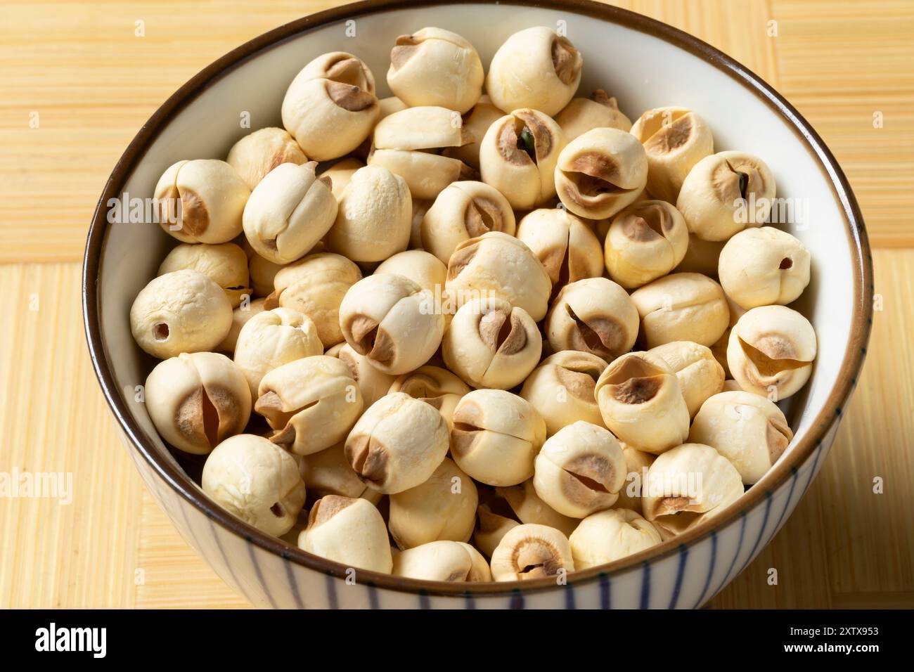 Bowl with dried Asian Lotus seed close up Stock Photo