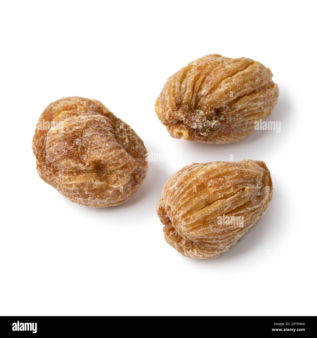 Dried chinese dates close up isolated on white background stock photo