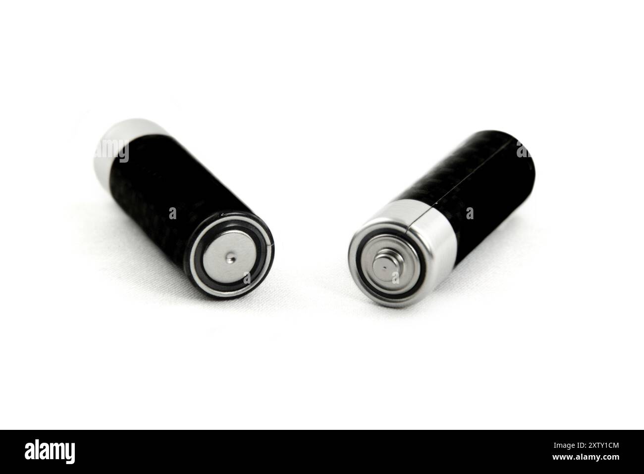 Plus and minus pole of two batteries Stock Photo - Alamy
