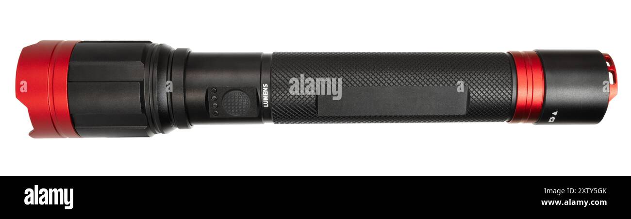 Isolated flashlight that is long and powerful seen from the on and off switch side. Stock Photo