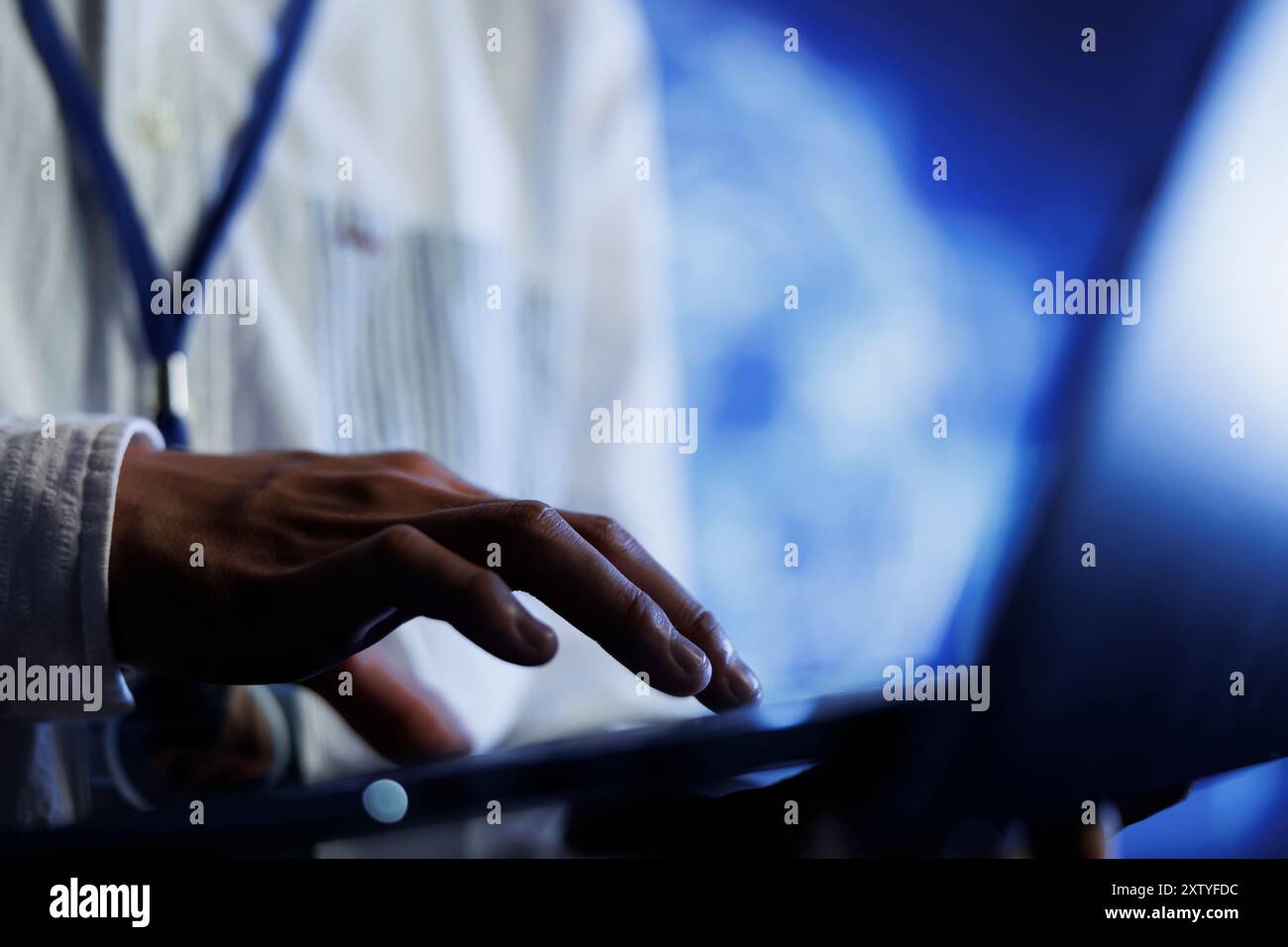 Certified engineer writes code on laptop to visualize artificial intelligence neural networks using augmented reality technology, close up. Data center expert runs AI script for information processing Stock Photo