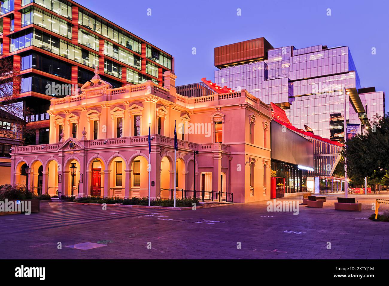 Scenic illuminated historic City of Parramatta public building of the Town Hall at sunset in Western Sydney. Stock Photo