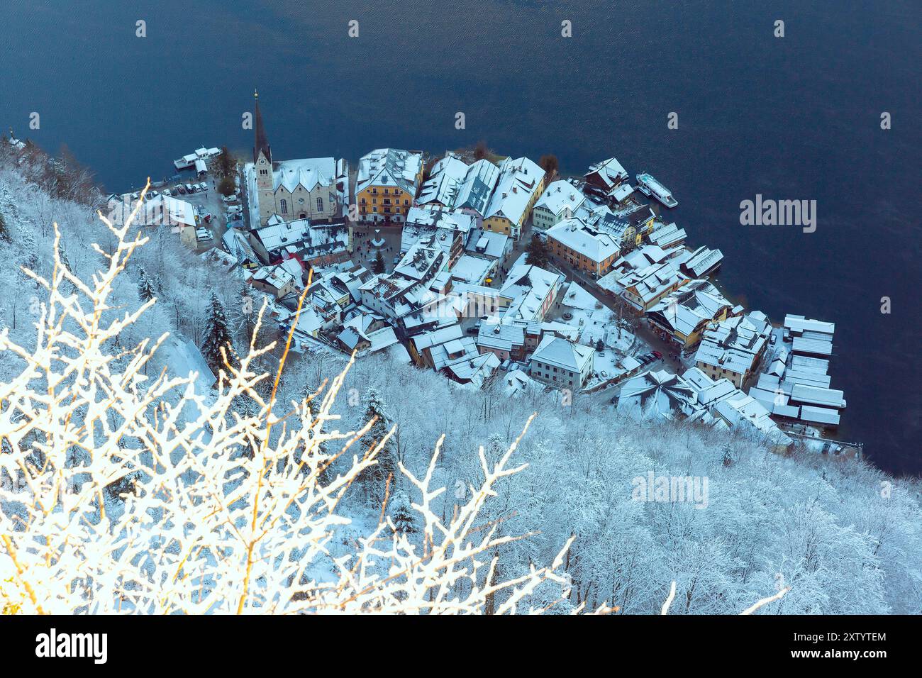 Snow-covered Hallstatt village and lake viewed from above in winter, Austria Stock Photo