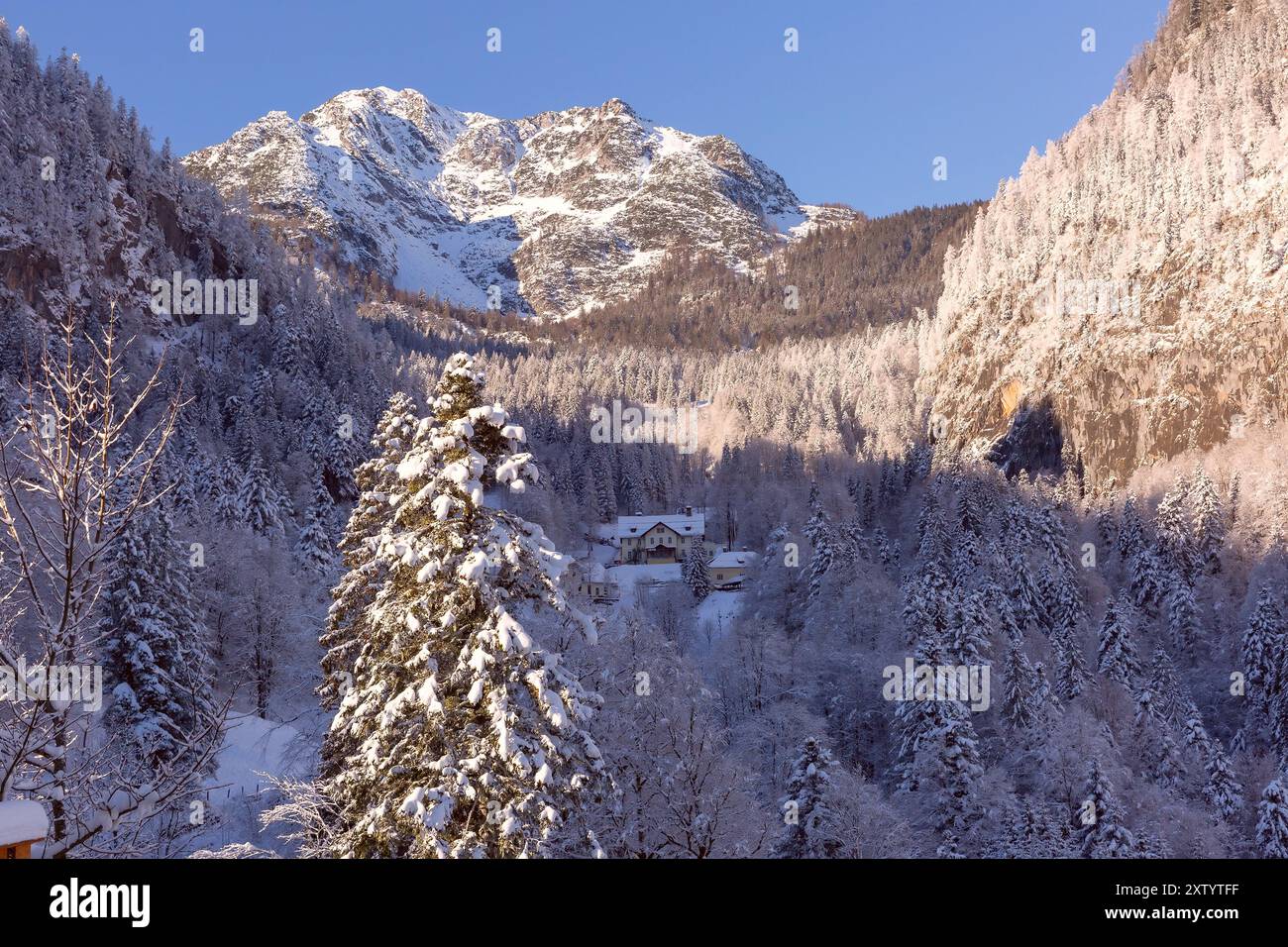 Aerial view of snow-covered Hallstatt, Austria, with the historic church of Hallstatt Stock Photo