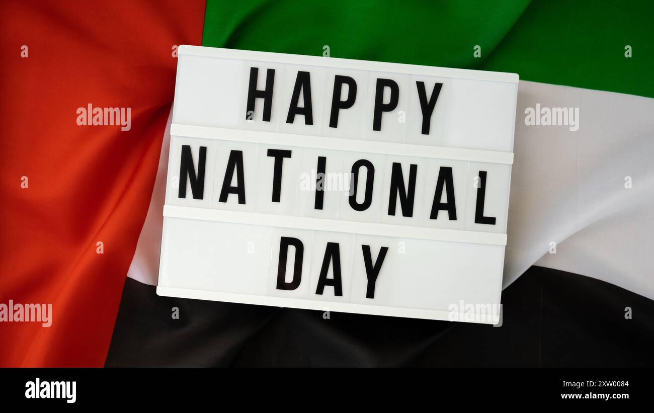 Lightbox HAPPY NATIONAL DAY text frame on United Arab Emirates waving ...