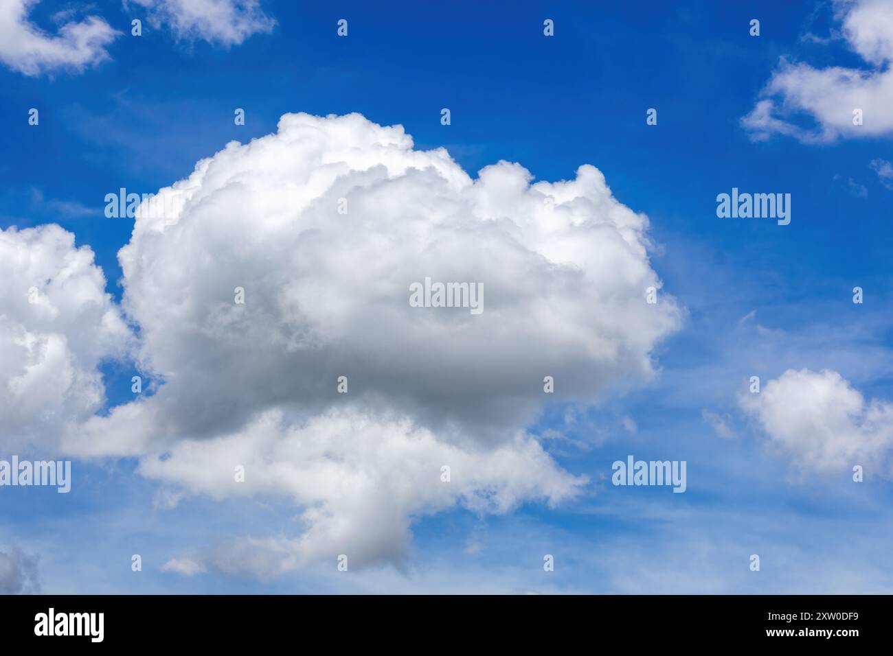 Beautiful blue sky and fluffy white clouds background Stock Photo - Alamy