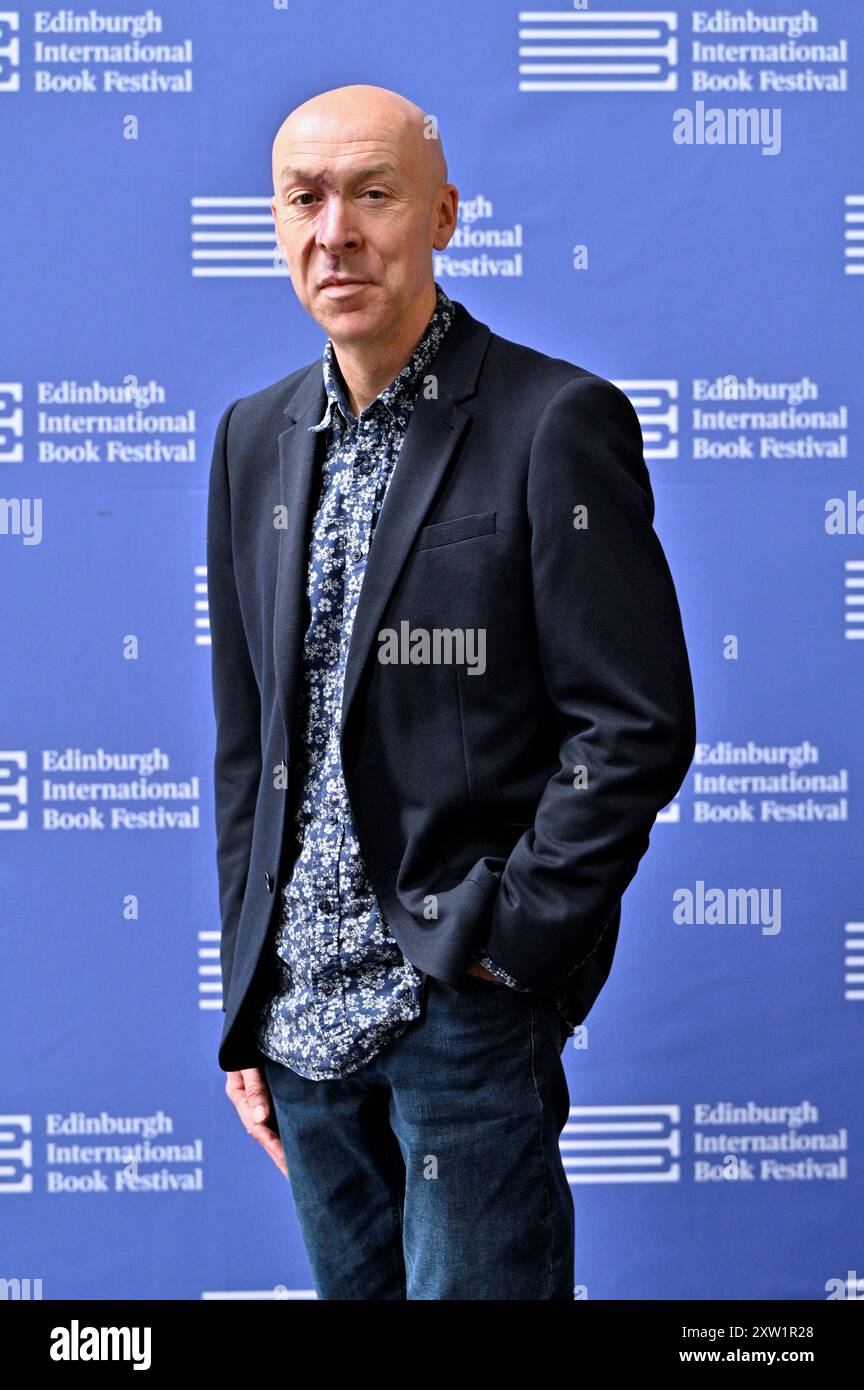 Edinburgh, Scotland, UK. 17th Aug 2024.  Edinburgh International Book Festival: Chris Brookmyre, award-winning Scottish crime writer, at the official photocall. Credit: Craig Brown/Alamy Live News Stock Photo