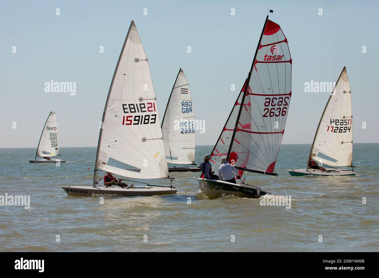 Local sailing enthusiatsts enjoying dinghy racing at Hythe,Kent,UK ...