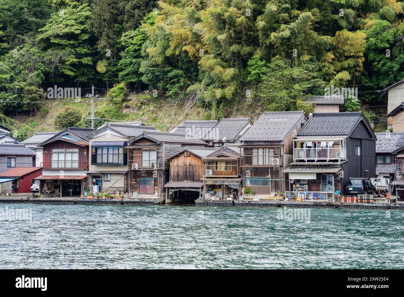 Beautiful scenic view with the wooden traditional waterfront boat houses called funaya around Ine Bay, in the village Ine, Japan Stock Photo