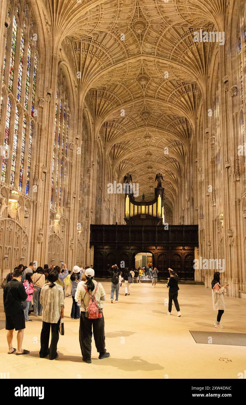 Kings College Chapel Cambridge; Interior with visitors and the rood screen and organ; Kings College Chapel Cambridge England UK; Travel. Stock Photo