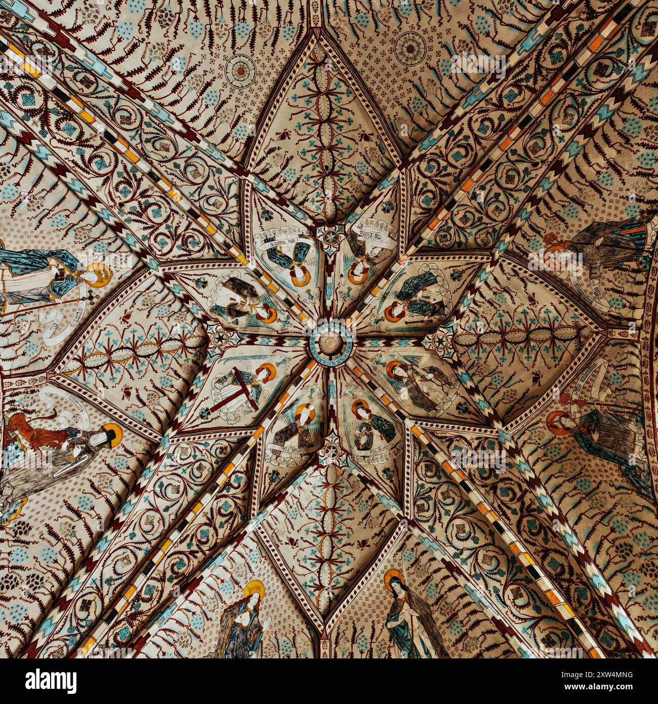 The ceiling in a medieval Swedish church highlighting the intricate patterns and paintings preserved. Stock Photo