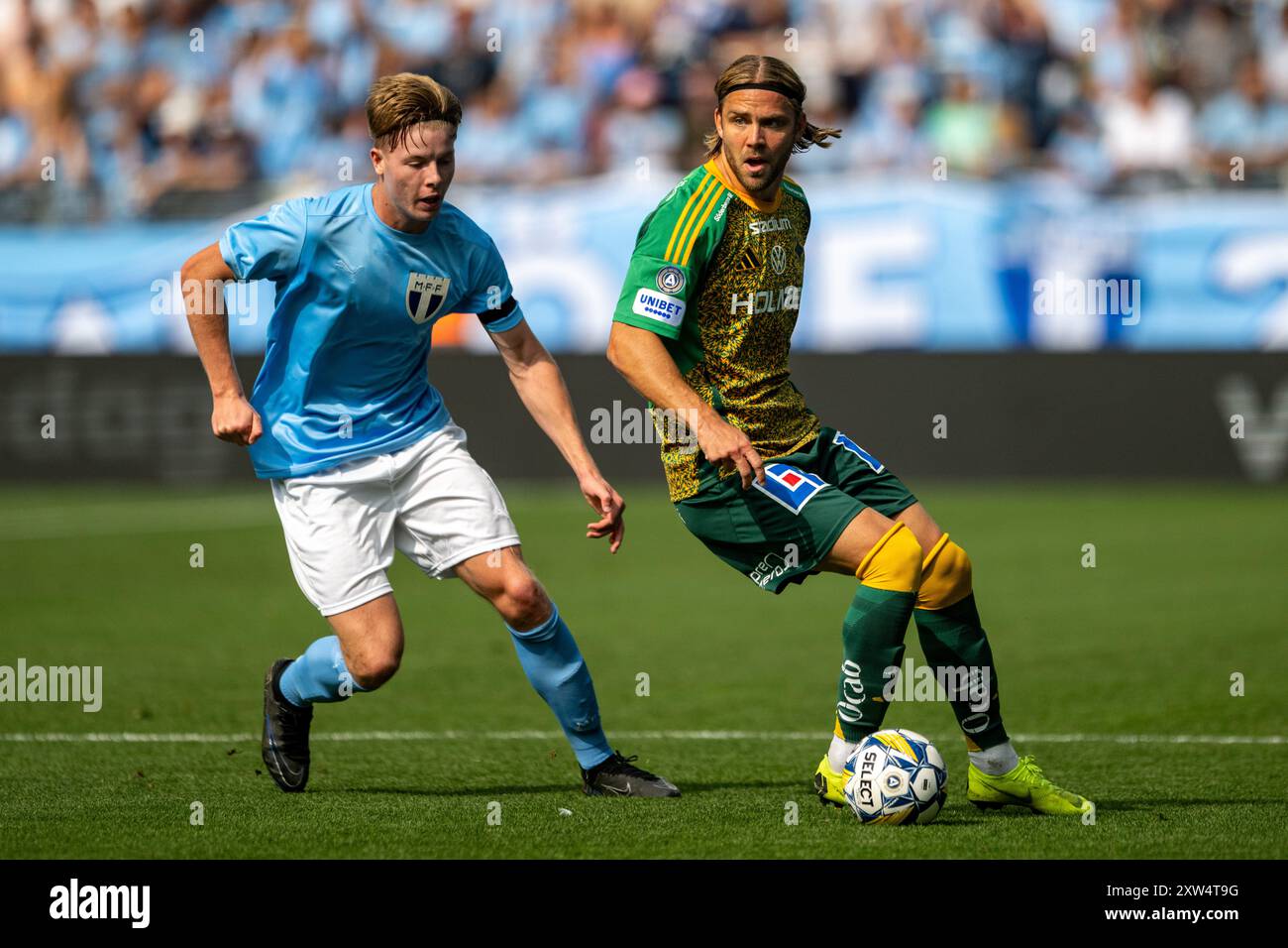 Malmoe, Sweden. 17th Aug, 2024. Christoffer Nyman (5) of IFK Norrkoping and  Nils Zetterström (35) of Malmoe FF seen during the Allsvenskan match  between Malmoe FF and IFK Norrkoping at Eleda Stadion
