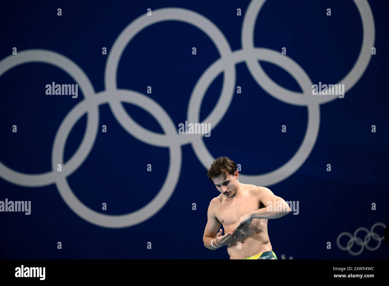 Kurtis Mathews of Australia warms up before the diving 3m Springboard