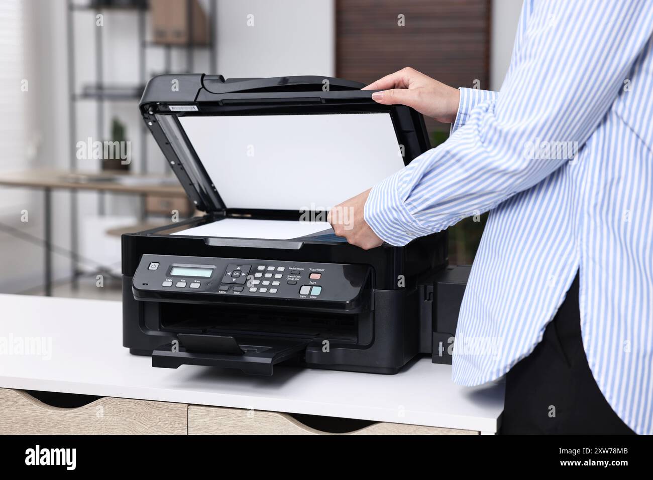 Someone Using The Printer Woman printer cartridge hi-res stock photography and images - Alamy