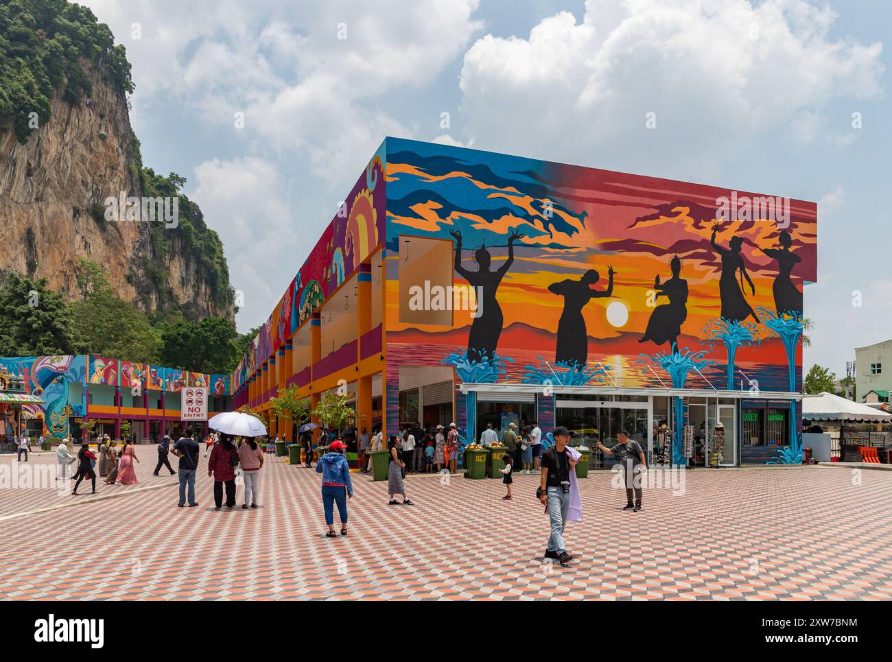 A picture of the colorful buildings near the Batu Caves complex ...