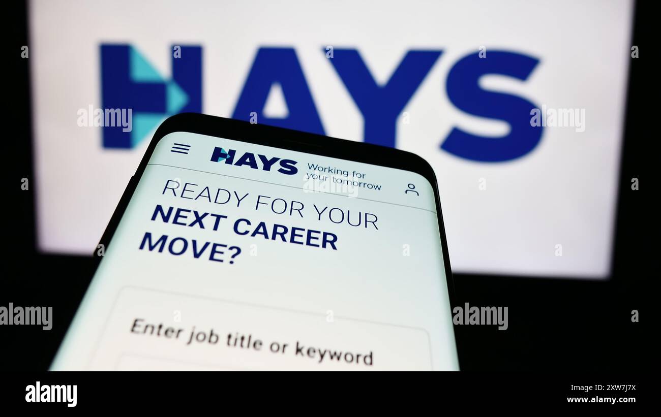 Mobile phone with website of British recruitment company Hays plc 
