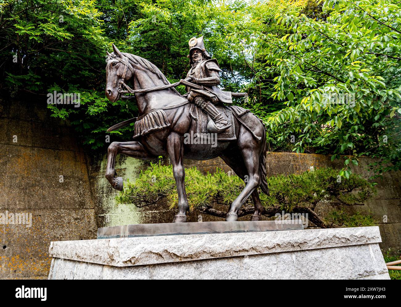 Statue of feudal lord Kato Yoshiaki, founder of Matsuyama Castle, at ...