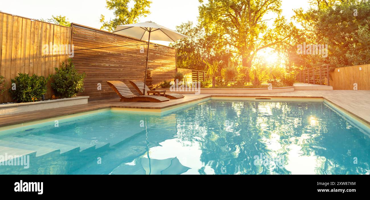 Panorama of luxury swimming pool in Modern Villa with Palm Trees and ...