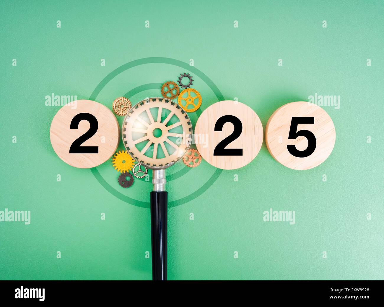 Happy New Year 2025 With Business Goal Searching And Management Concept Happy New Year 2025 With Business Goal Searching And Management Concept Target Icon In Magnifying Glass Lens With Gears With 2025 Calendar Number On 2XW8928