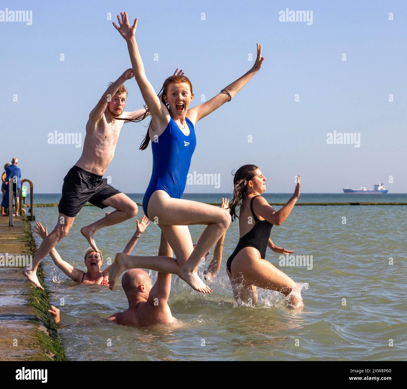 pic shows:  Weekenders take a last early morning dip in the Walpole Bay tidal pool  In Margate, Kent before heading back to work.   Hot Weather, Marga Stock Photo