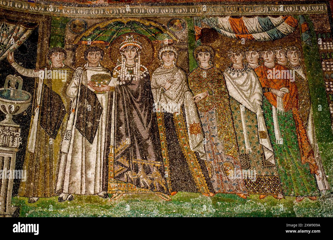 Mosaic of Empress Theodora and attendants. Interior of Basilica of San Vitale, which has important examples of early Christian Byzantine art and archi Stock Photo