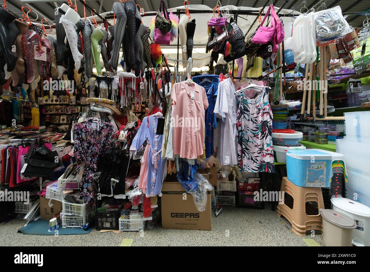 View of the stalls at Bullring Rag Market offering all kinds of items ...