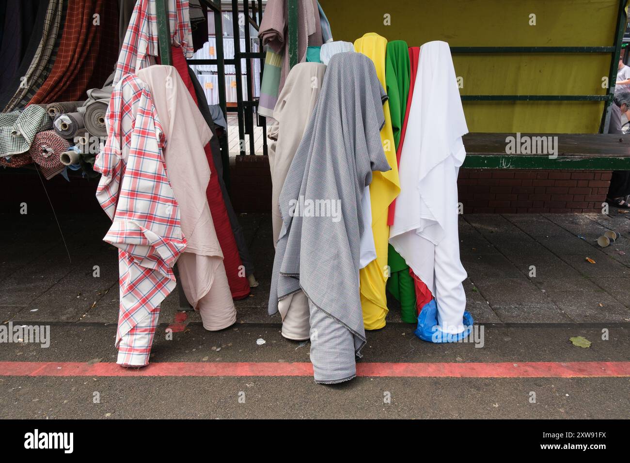 View of the stalls at Bullring Rag Market offering all kinds of items ...
