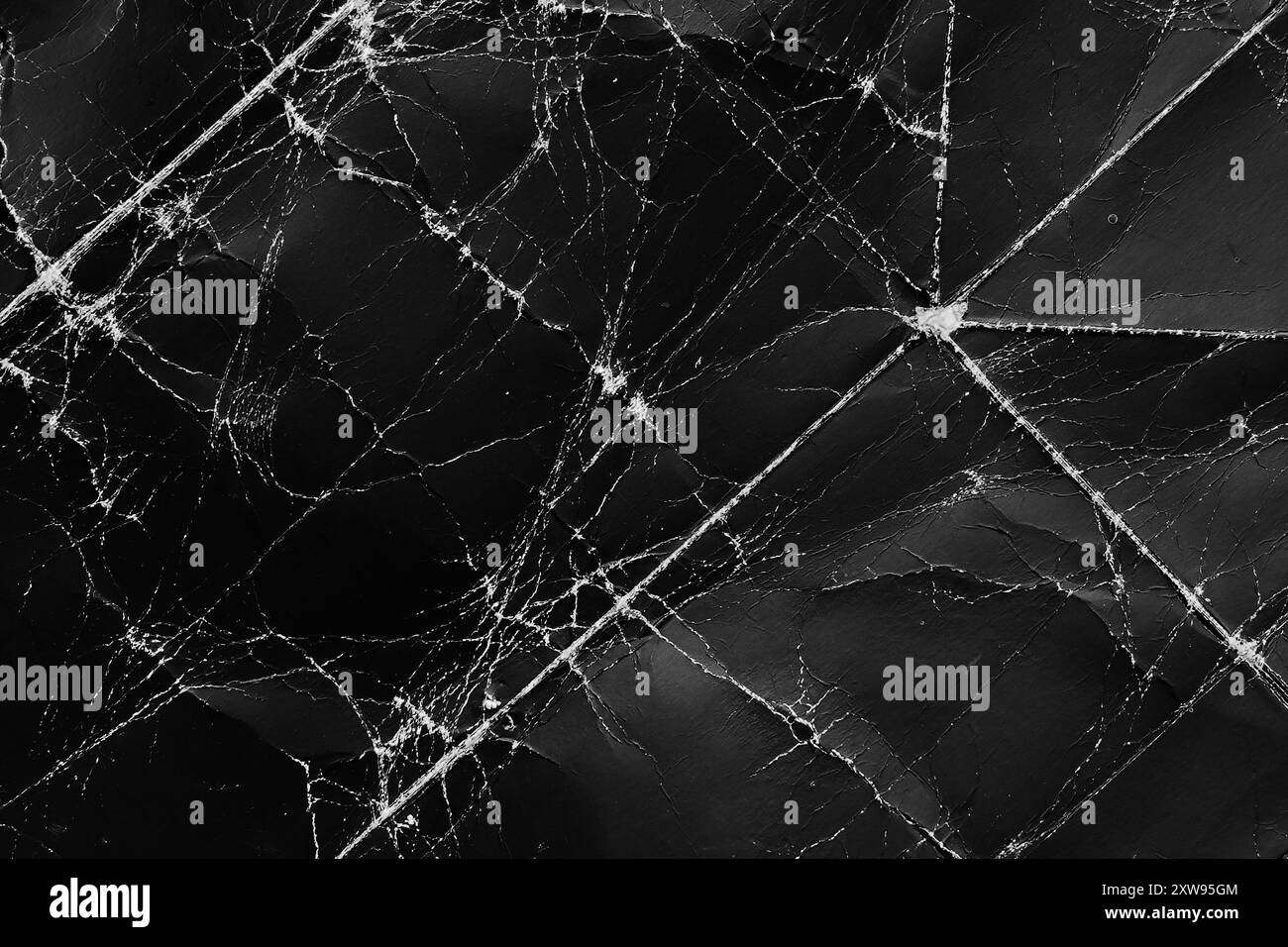 Old wrinkled texture of black crumpled old paper with worn scratches ...