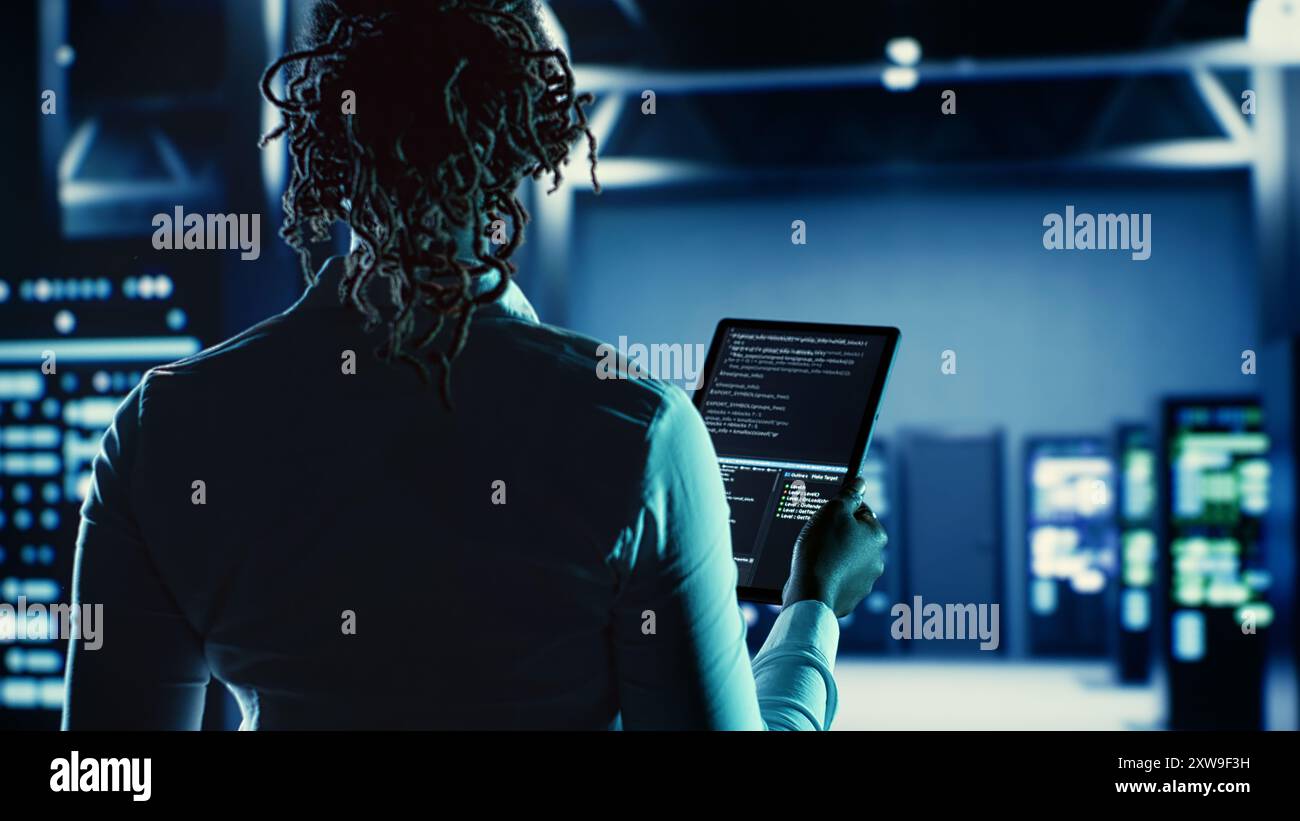 Knowledgeable woman running code hi-res stock photography and images ...
