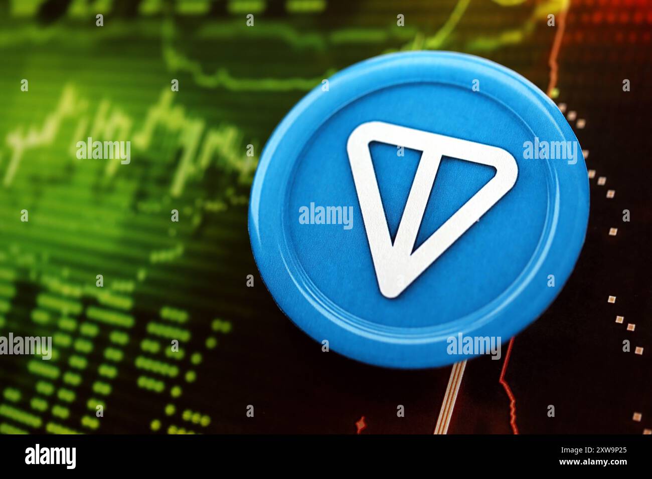 KYIV, UKRAINE - AUGUST 17, 2024 Telegram TON coin on dark cryptocurrency  digital trading chart in green and red colors close up Stock Photo - Alamy