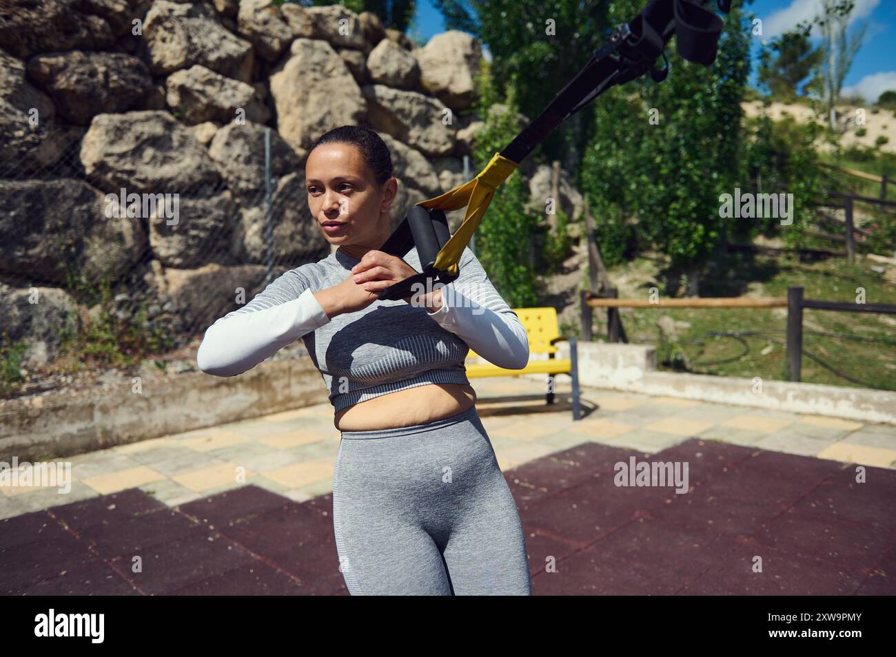 Woman using trx bands hi-res stock photography and images - Alamy